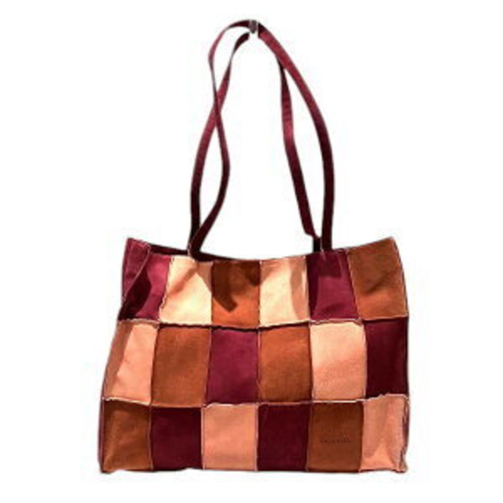 Chanel patchwork tote bag on shoulder